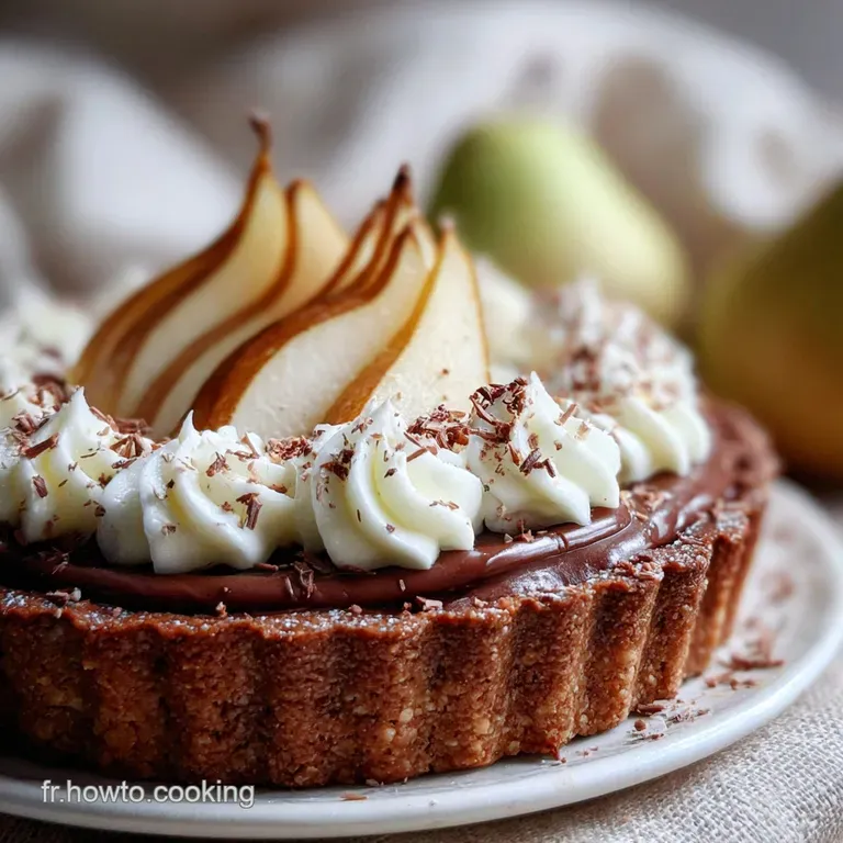 Slice of pear chocolate tart served on a white plate, dusted with cocoa powder, showcasing the layers and textures.